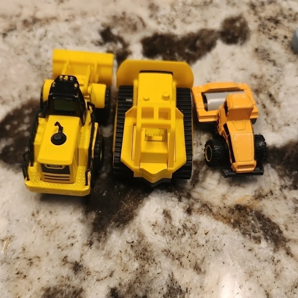 3 construction cars 2 Tonka and 1 road construction